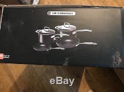 Le creuset toughtened non-stick 4 piece cookware set. Brand new never used
